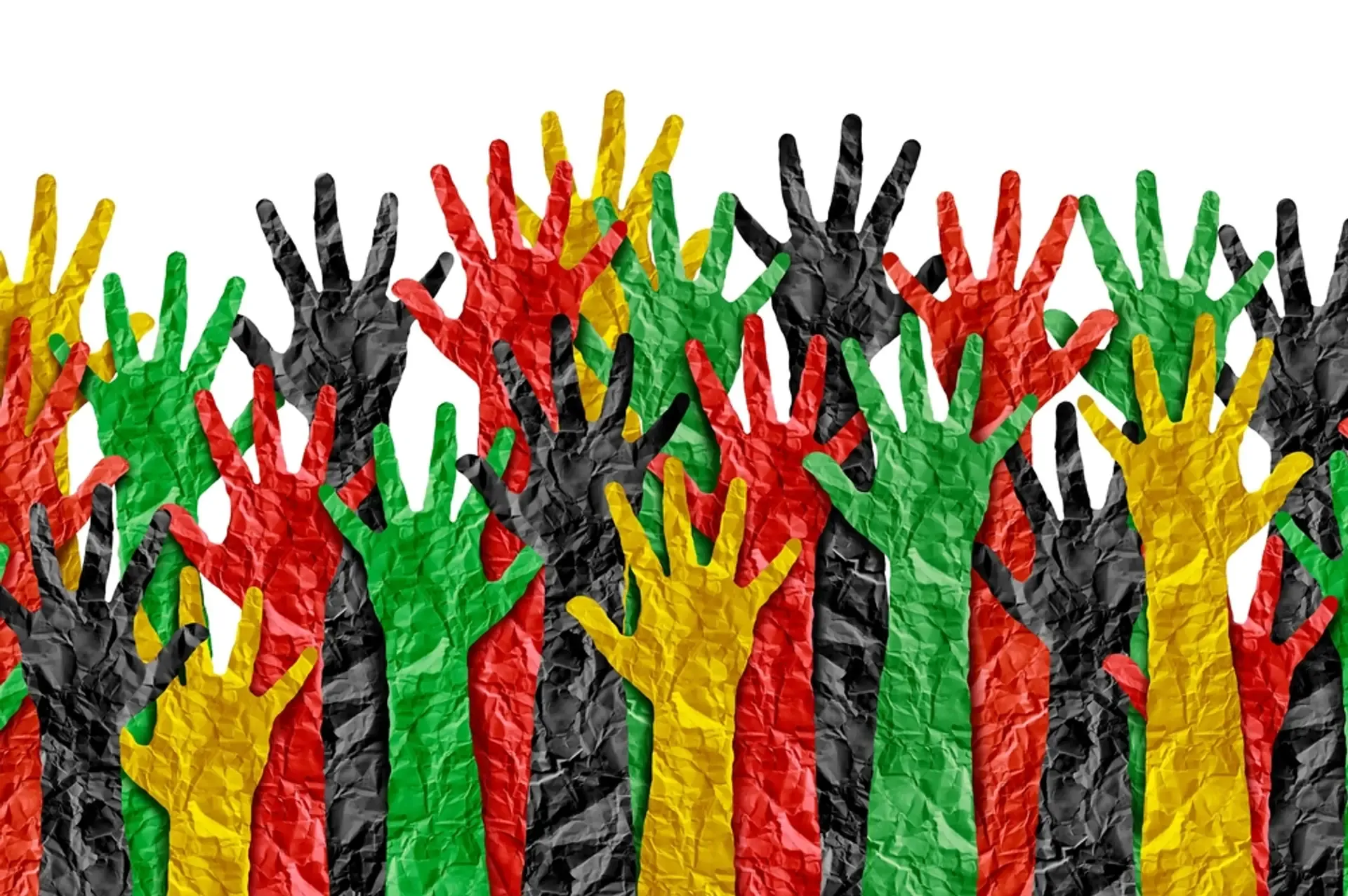 Many hands, in colors of red, yellow, black and green, reaching up toward the sky.